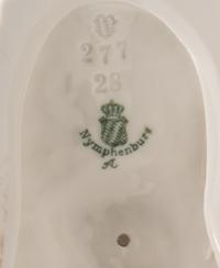 A Group of Twelve Nymphenburg Porcelain Equestrian Groups