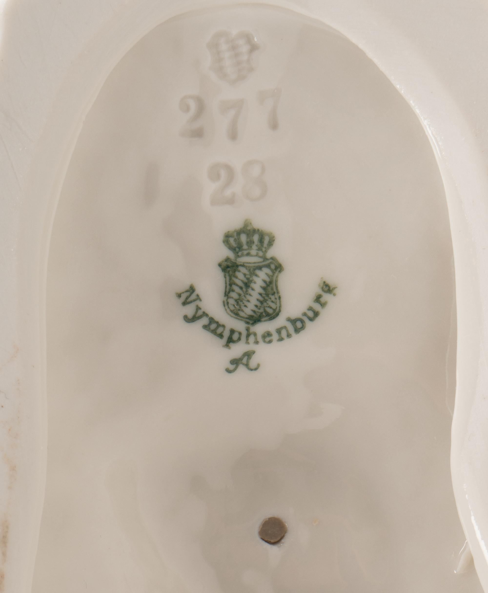 A Group of Twelve Nymphenburg Porcelain Equestrian Groups