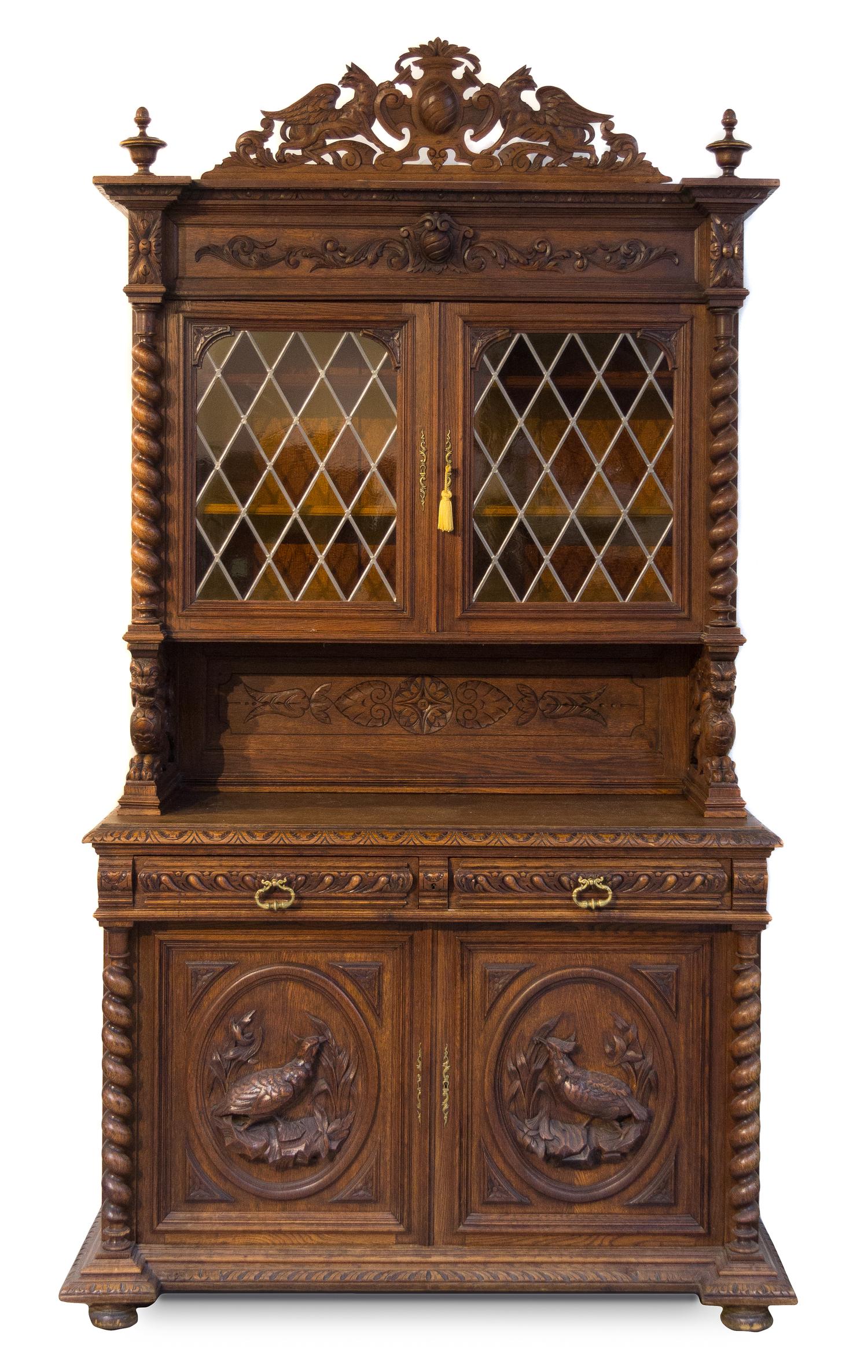 A Renaissance Revival Oak Court Cupboard Height 102 x width 58 x depth 24 inches. — FIRST HALF 20TH CENTURY