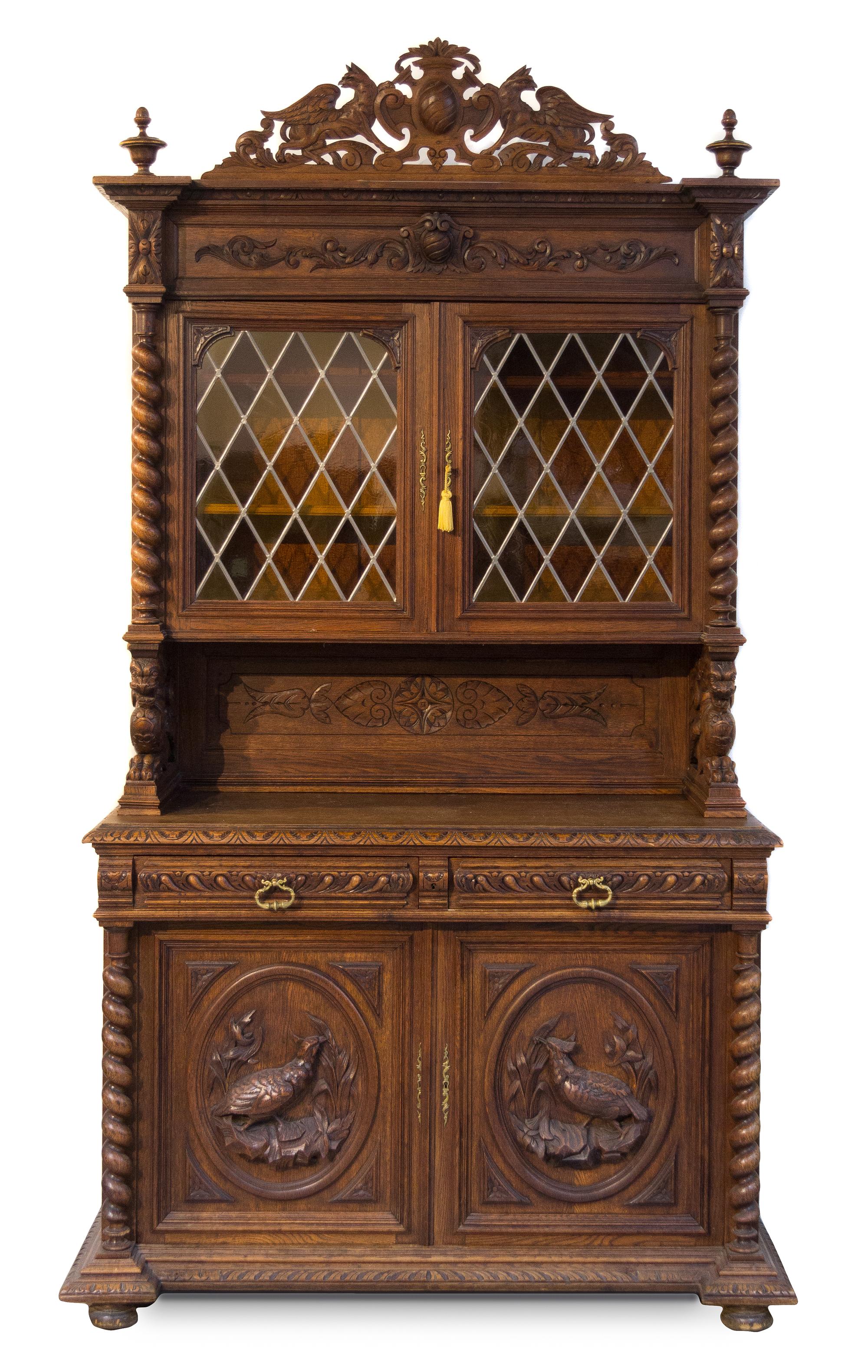 A Renaissance Revival Oak Court Cupboard Height 102 x width 58 x depth 24 inches. — FIRST HALF 20TH CENTURY