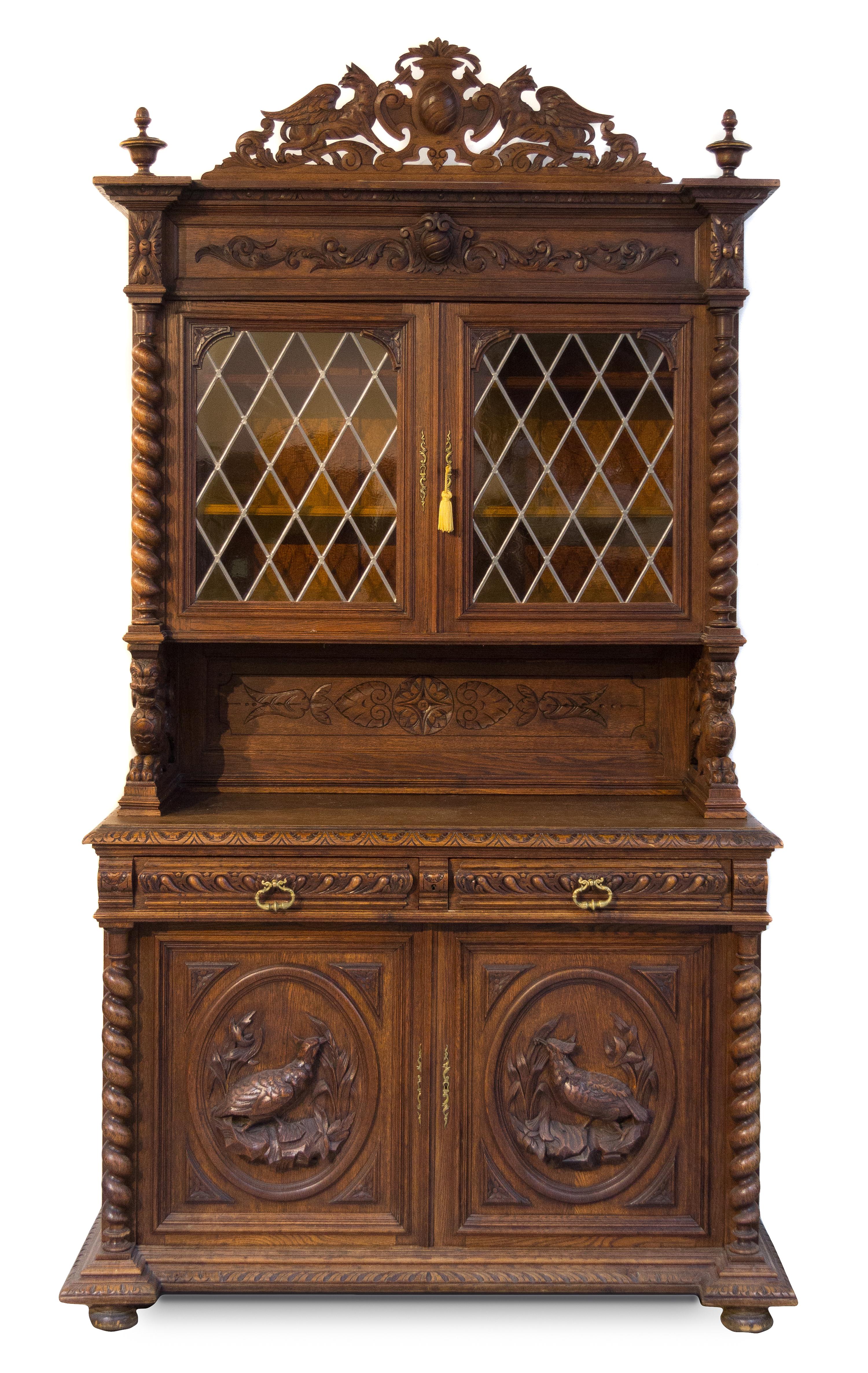 A Renaissance Revival Oak Court Cupboard Height 102 x width 58 x depth 24 inches. — FIRST HALF 20TH CENTURY