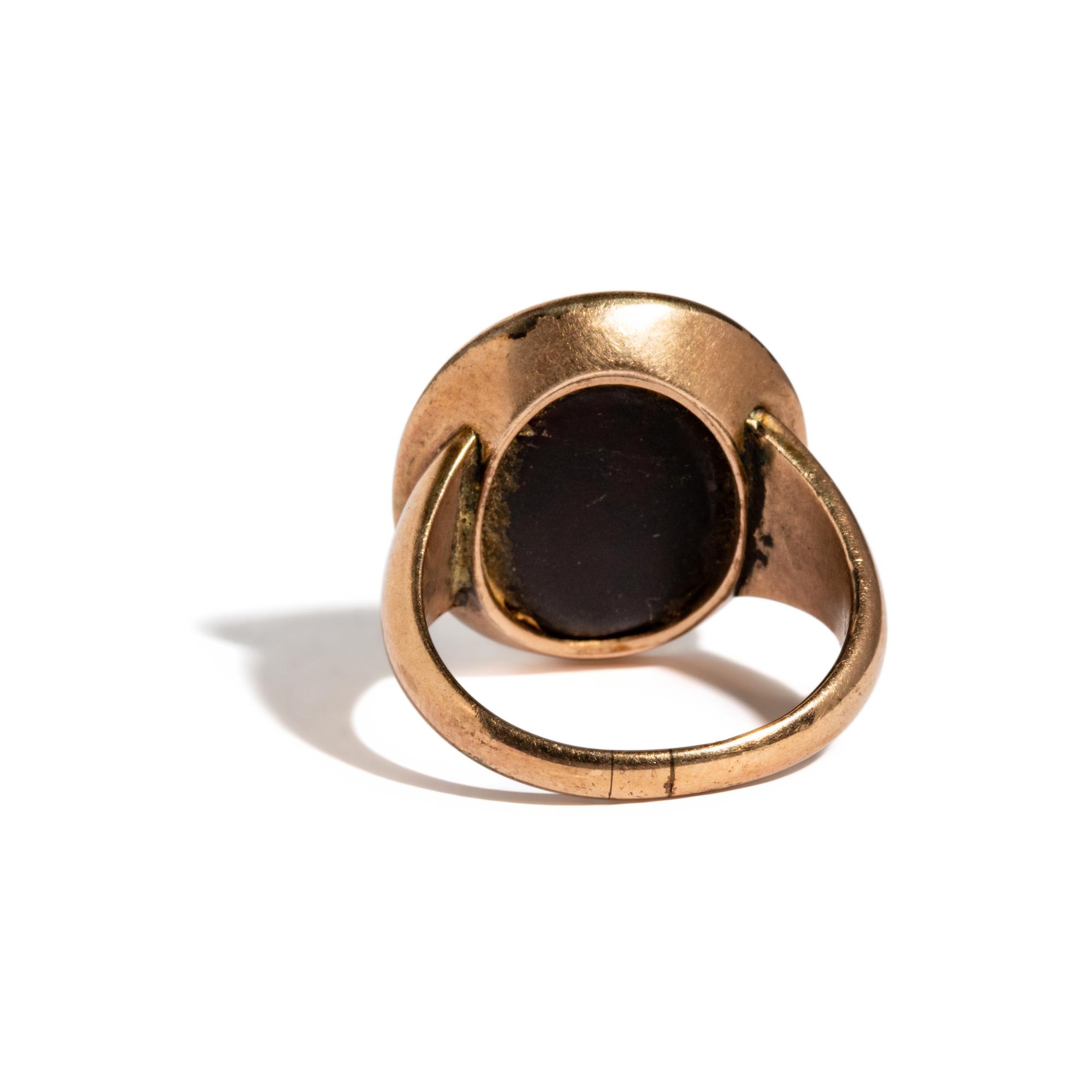 A Neoclassical Gold and Glass Finger Ring with a Portrait Head of a Roman Emperor