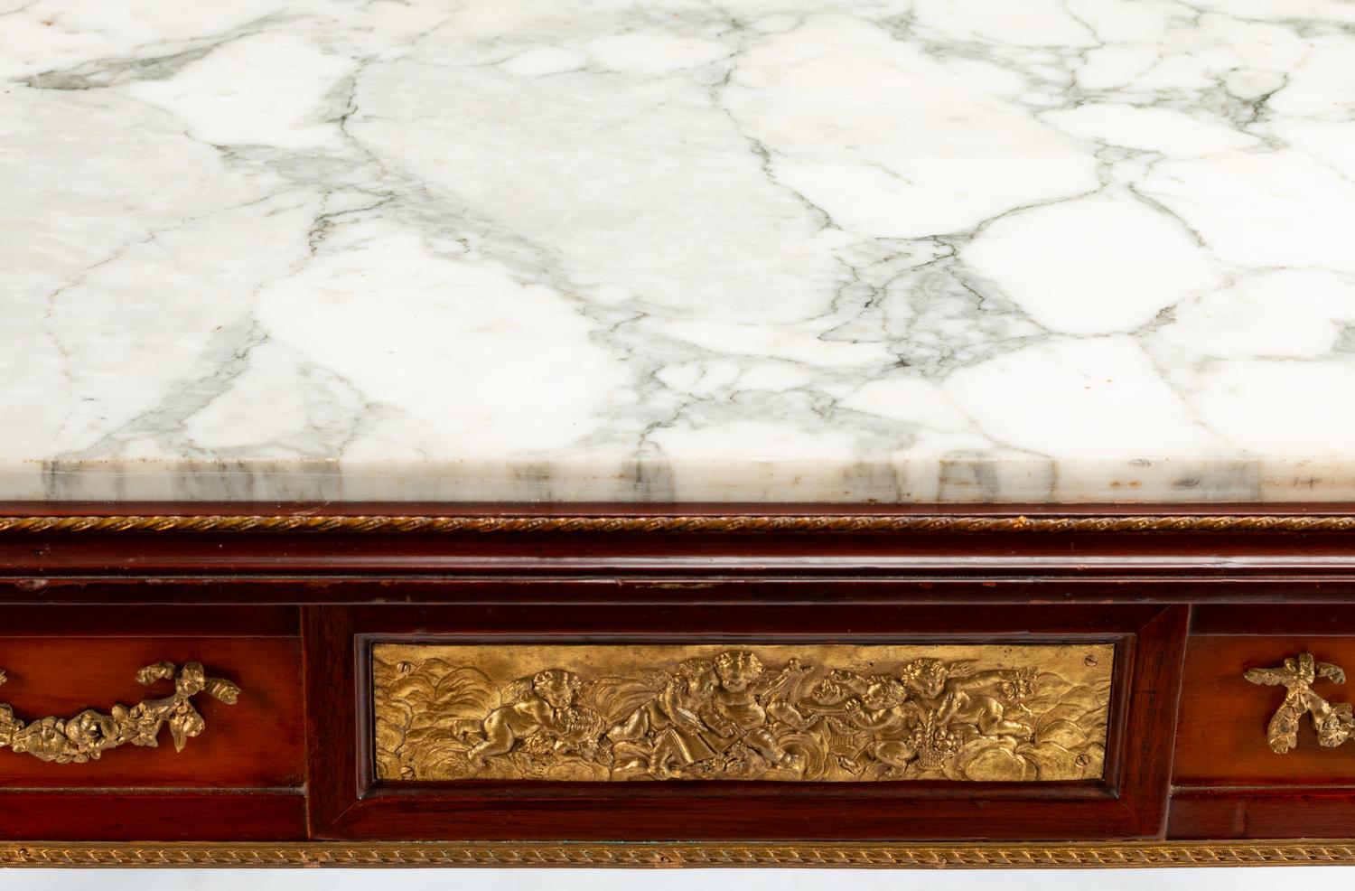 A Louis XVI Style Gilt Bronze Mounted Mahogany Marble-Top Center Table