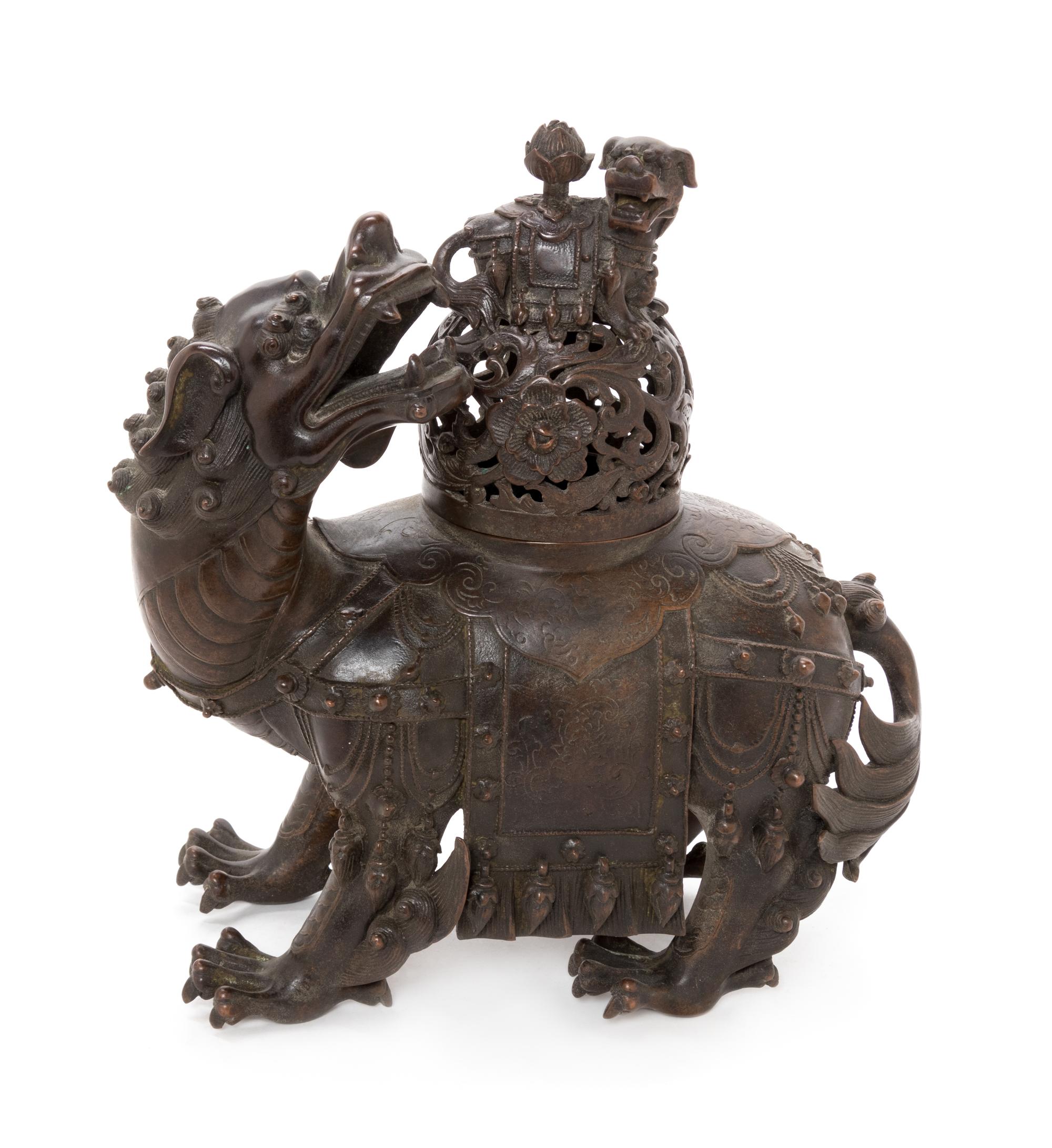 A Chinese Bronze Qilin-Form Incense Burner Height 12 inches. — 20TH CENTURY