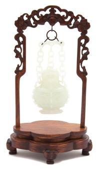 A Carved Near-White Jade Covered Vase — 20TH CENTURY