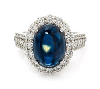 An 18 Karat White Gold, Sapphire and Diamond Ring, 4.90 dwts.