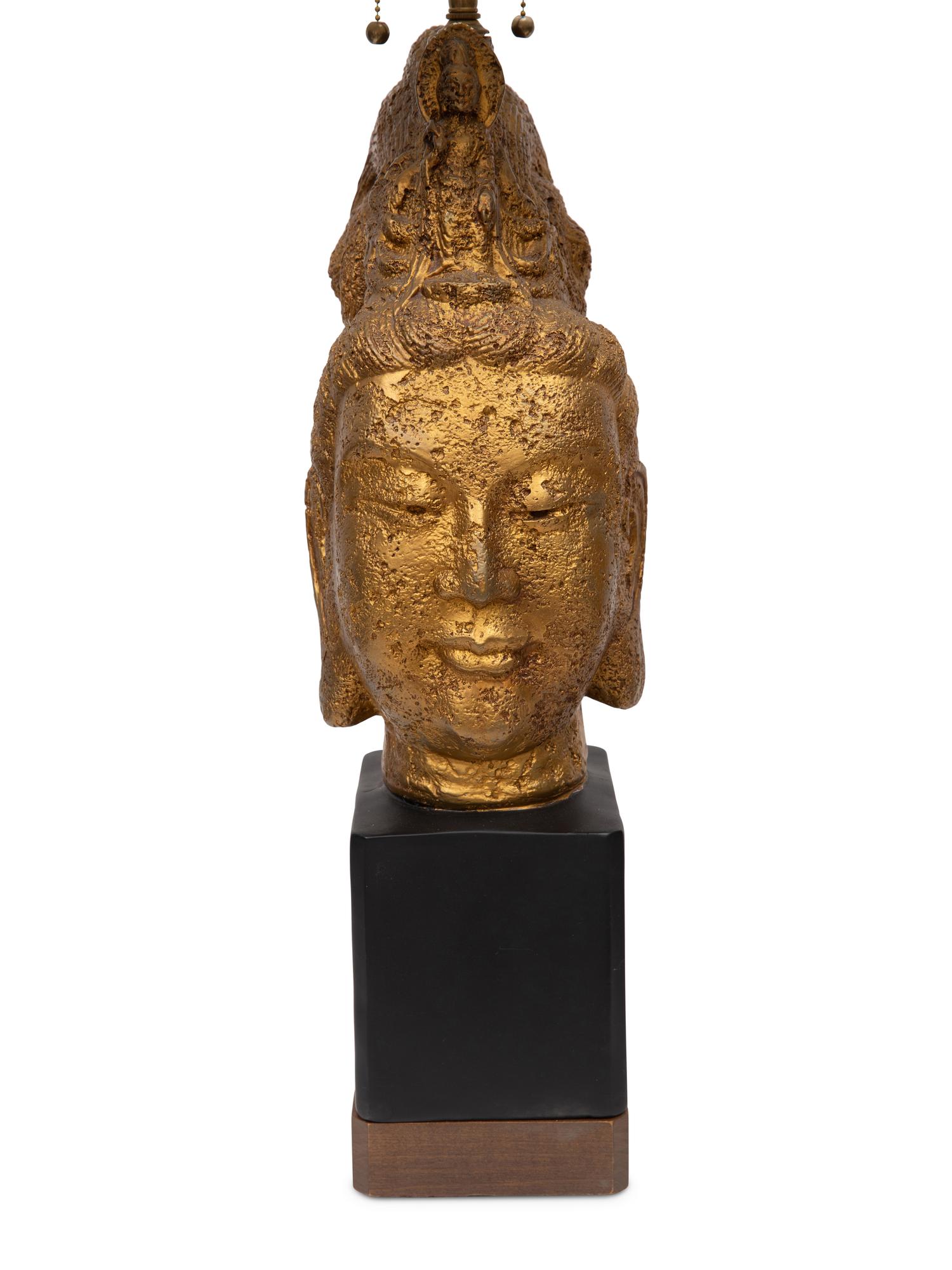 A Pair of Gilt Composition Buddha Lamps
