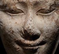 An Egyptian Limestone Head of a Noblewoman