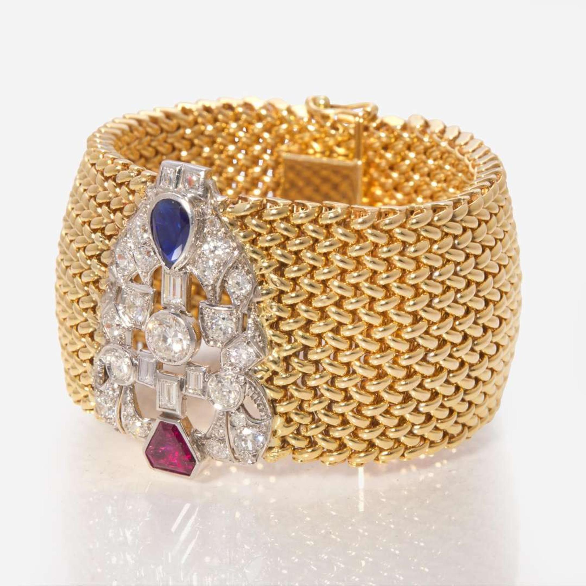 An 18K Yellow Gold, Platinum, and Gemstone Bracelet