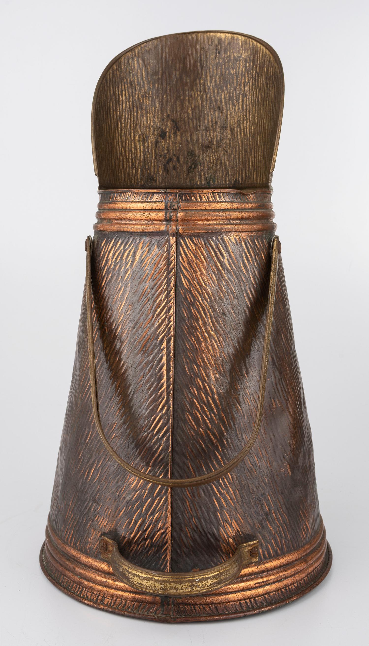 [WILD WEST SHOWS]. Buffalo Bill Cody copper coal scuttle. N.p., n.d.