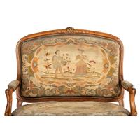 A Suite of Louis XV-Style Carved Walnut Needlework Upholstered Seating Furniture