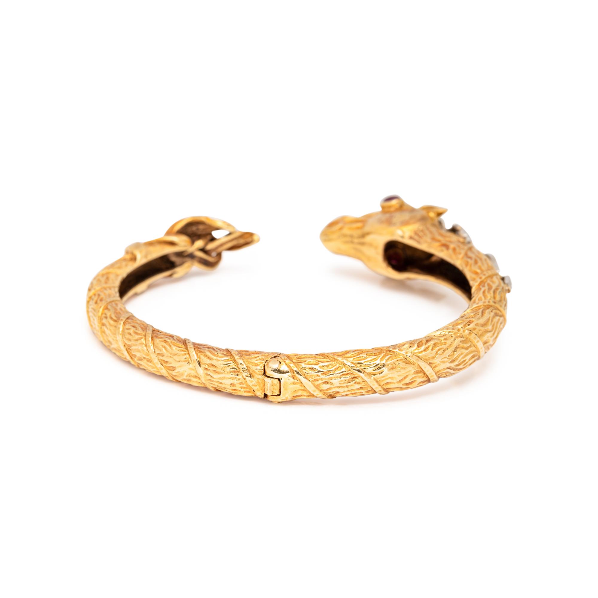 DAVID WEBB, YELLOW GOLD, DIAMOND AND RUBY HORSE CUFF BRACELET