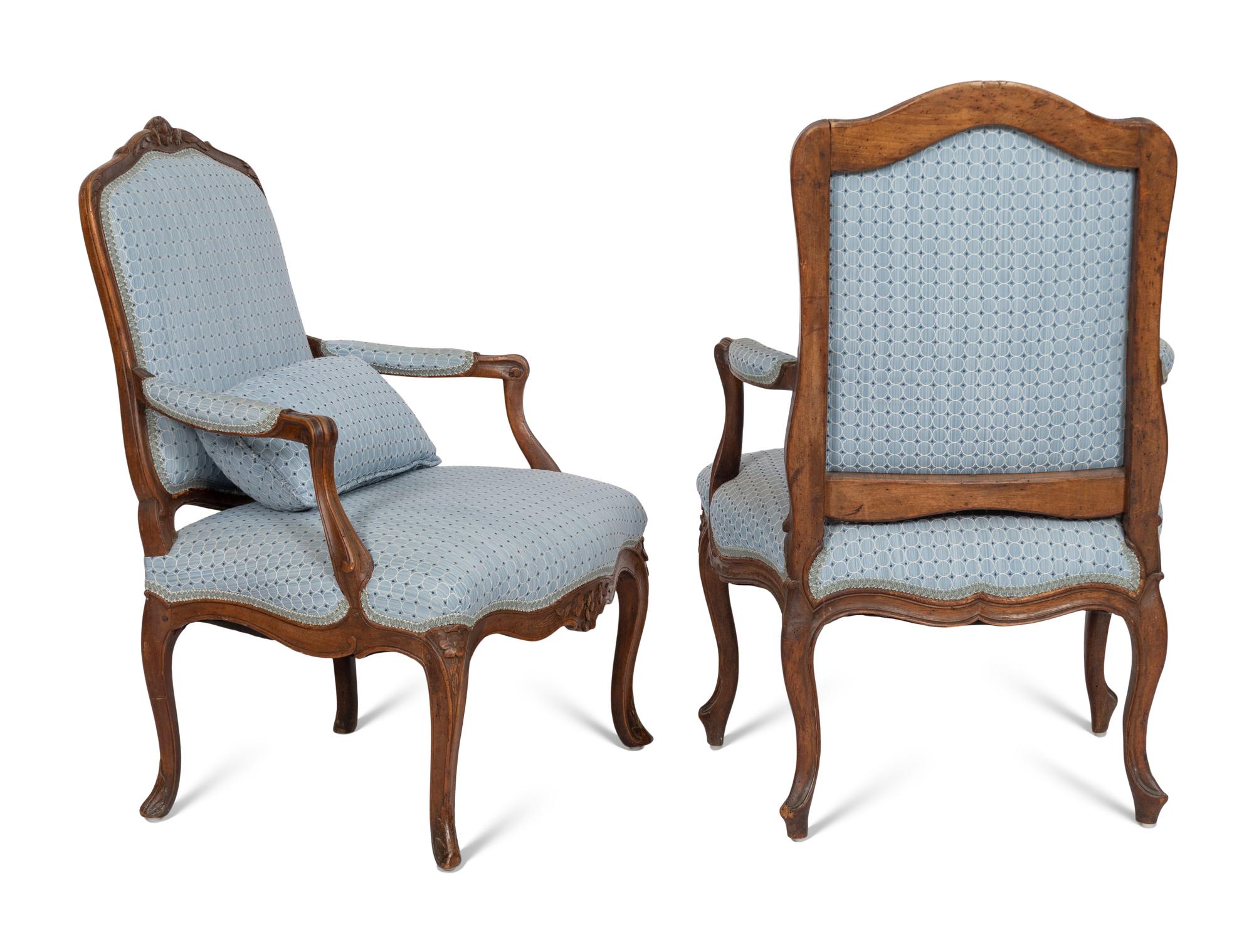 Two Louis XV Style Carved Walnut Fauteuils
