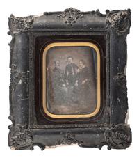 [EARLY PHOTOGRAPHY]. An oversized half plate daguerreotype portrait of a French military officer and his family.