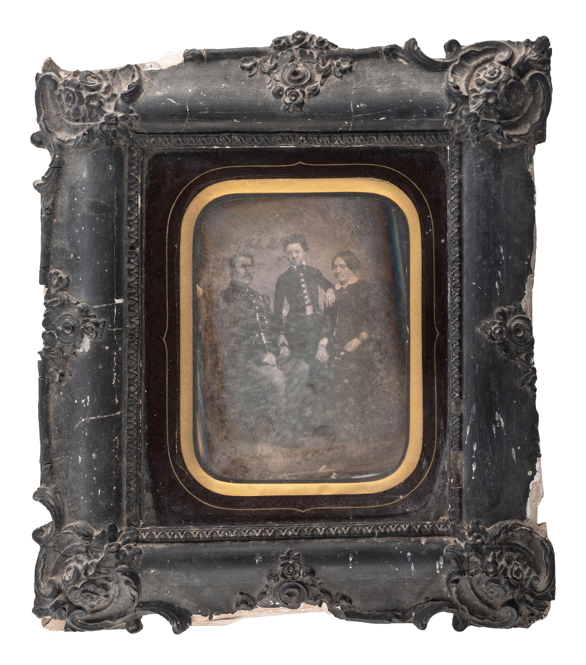 [EARLY PHOTOGRAPHY]. An oversized half plate daguerreotype portrait of a French military officer and his family.