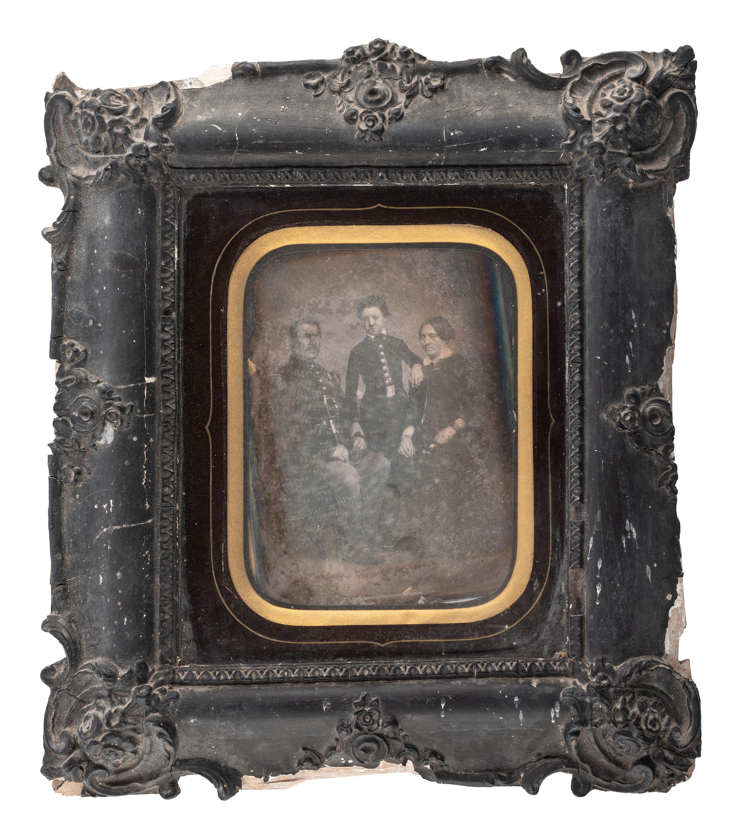 [EARLY PHOTOGRAPHY]. An oversized half plate daguerreotype portrait of a French military officer and his family.
