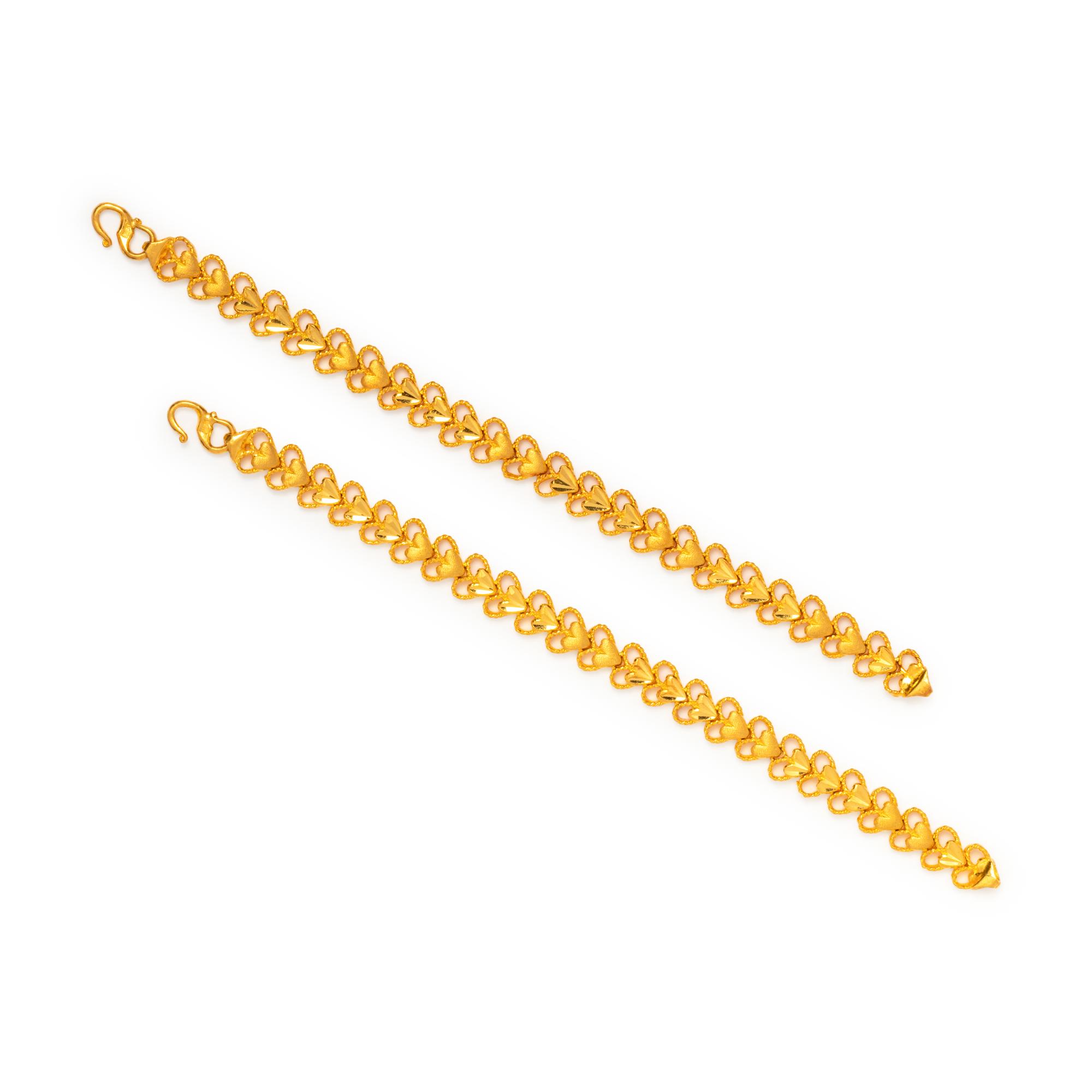 PAIR OF HIGH KARAT GOLD BRACELETS