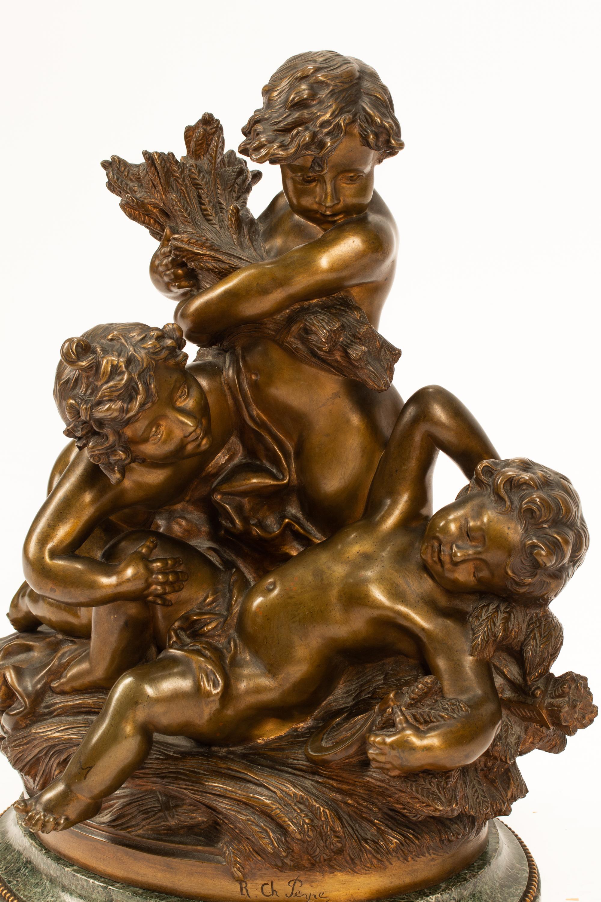 Raphael Peyre (French, 1872-1949) Three Putti gilt bronze Height 22 inches.