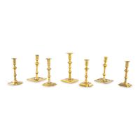 A Group of Seven Brass Candlesticks