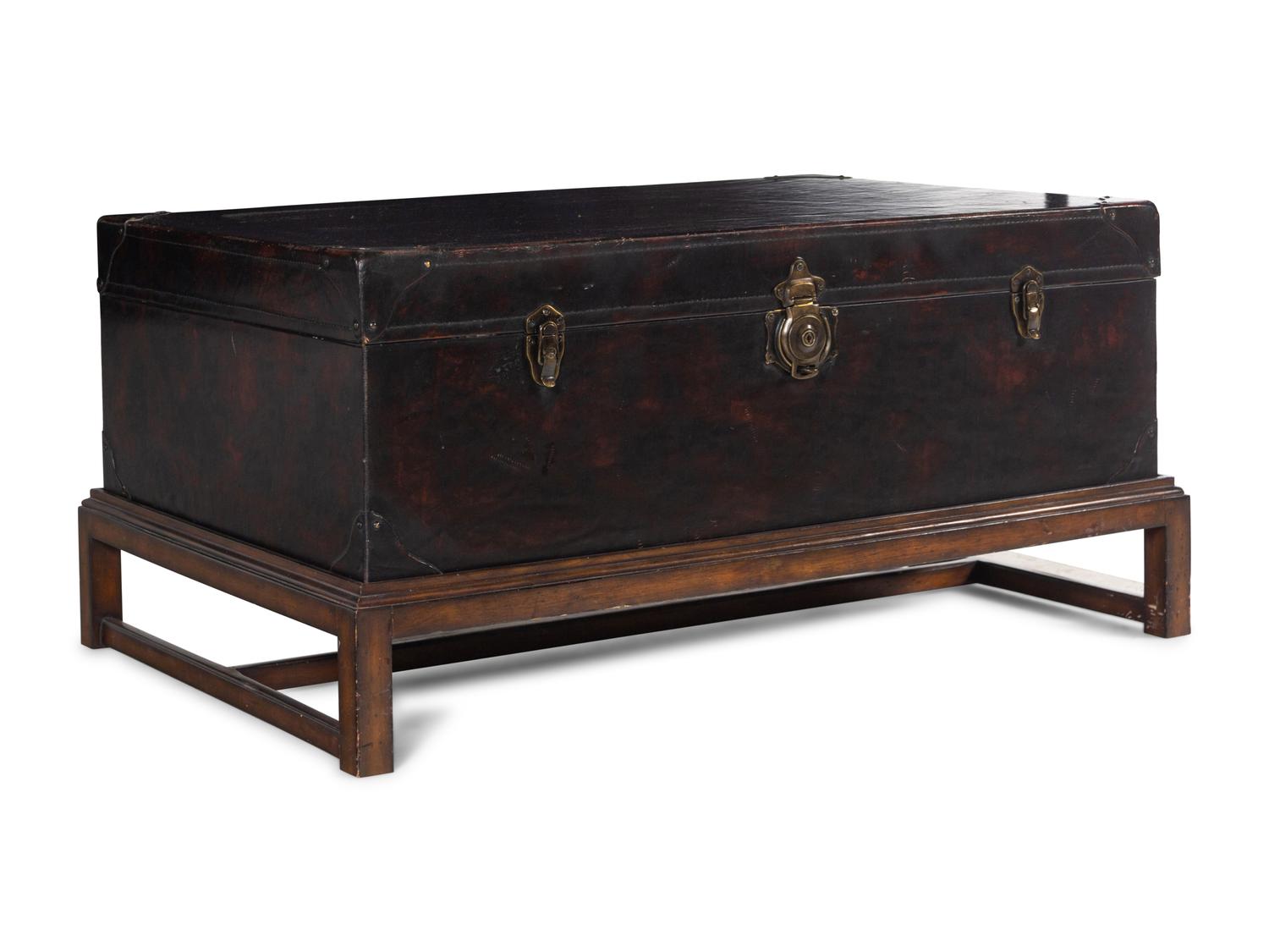 A Leather-Veneered Trunk on a Later Stand