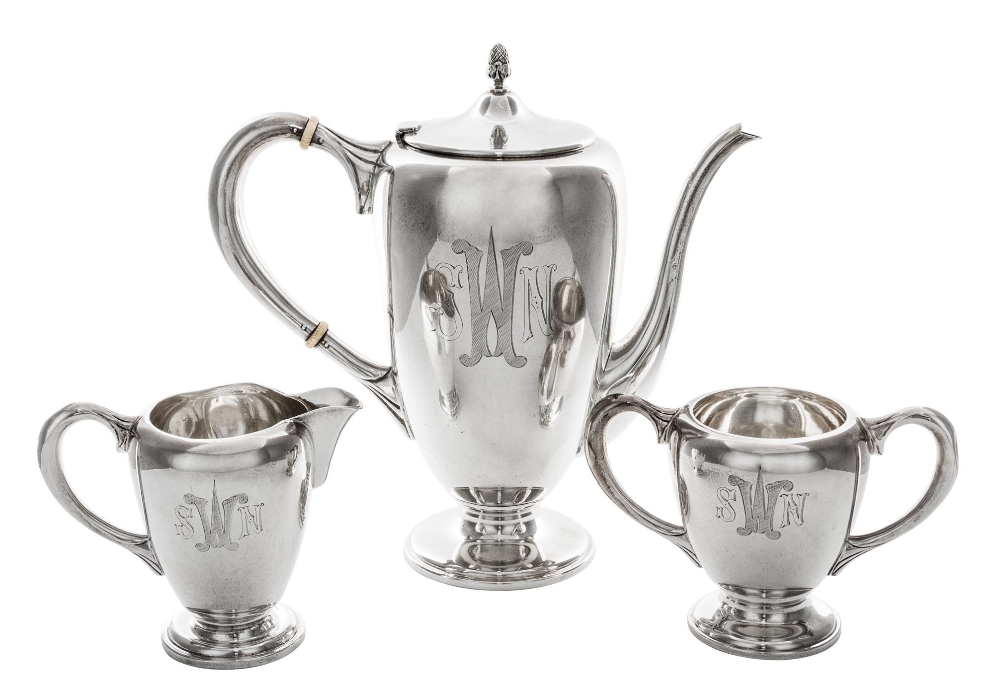 An American Silver Coffee Service, M. Fred Hirsch Co., Jersey City, NJ, comprising a coffee pot, a creamer and an open sugar engraved w