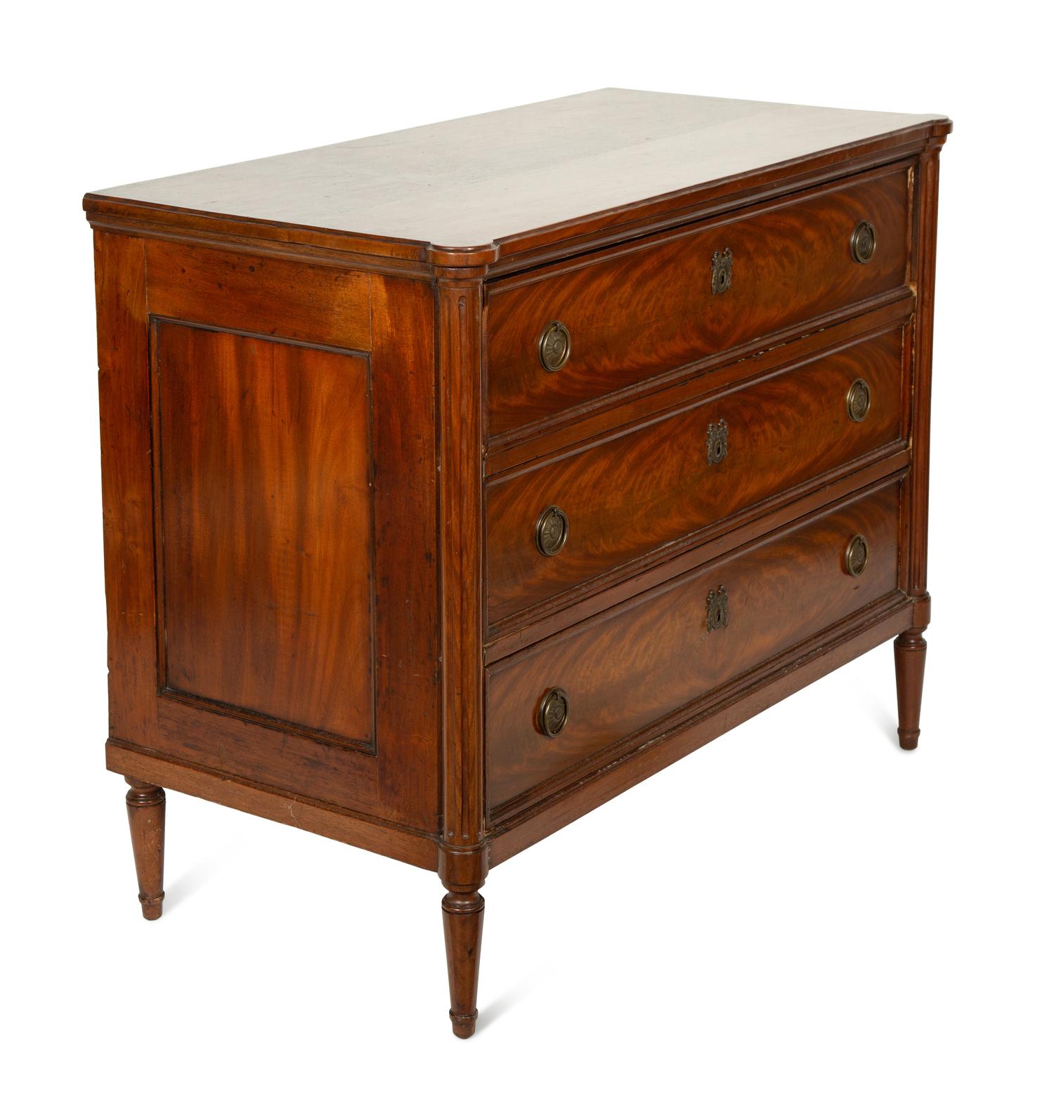 A Louis XVI Style Mahogany Commode