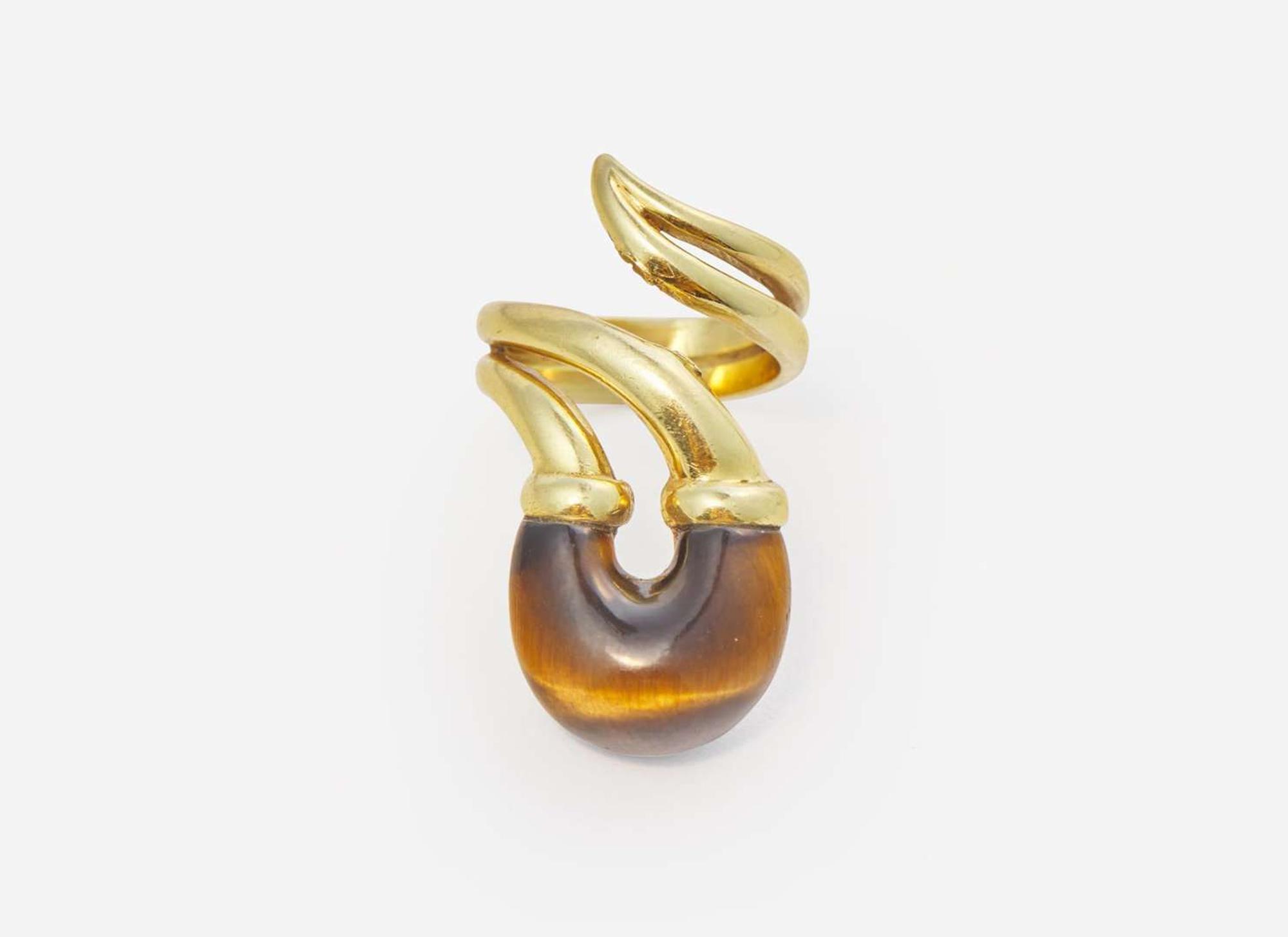 An 18K Yellow Gold and Tiger's Eye Ring