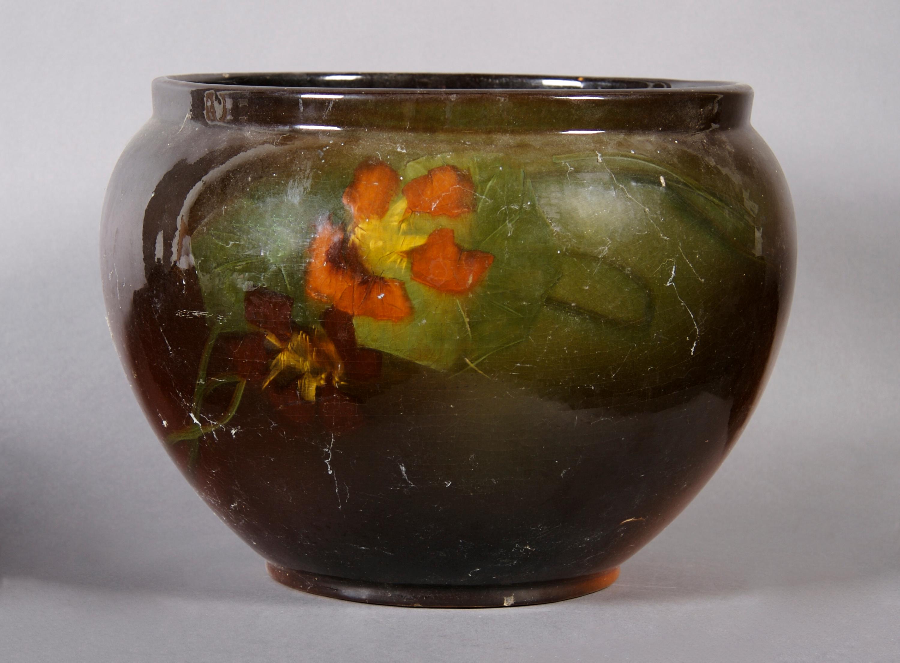 A Weller Louwelsa Pottery Jardiniere, Height 8 1/2 inches.