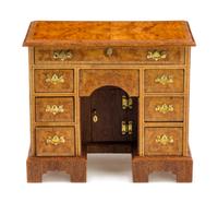 A George III Style Burlwood Kneehole Desk Height 2 1/2 x width 2 7/8 x depth 1 5/8 inches. — John J. Hodgson, 1997