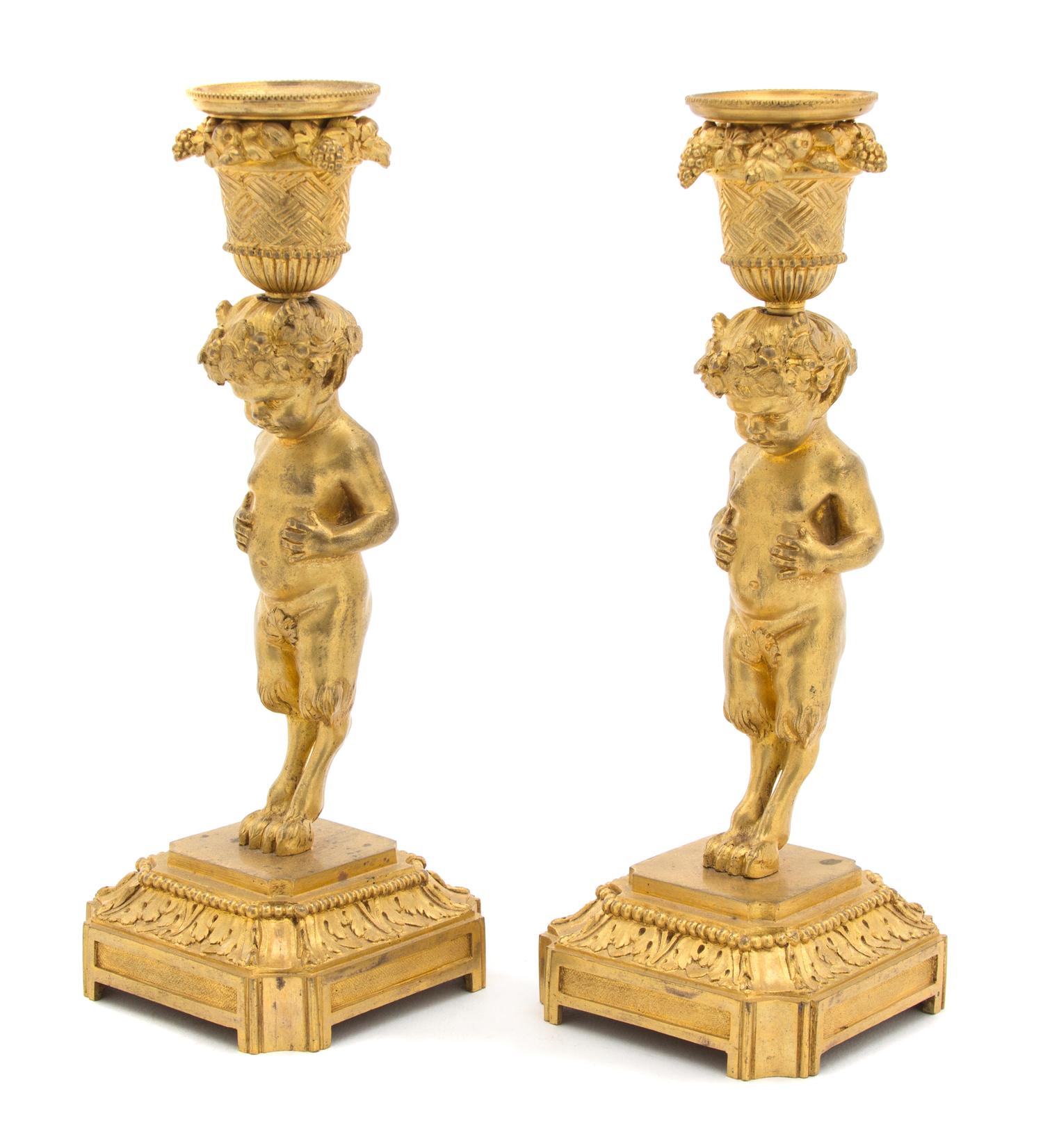 A Pair of French Gilt Bronze Candlesticks Height 8 x diameter squared 3 inches. — 19TH CENTURY