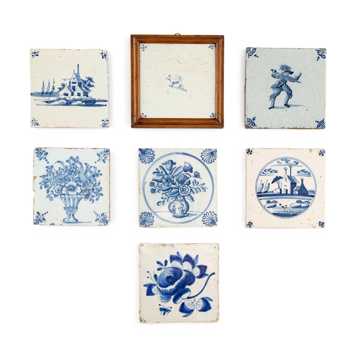A Collection of Seven Delft Blue and White Decorated Tiles