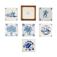 A Collection of Seven Delft Blue and White Decorated Tiles