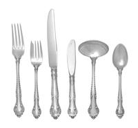 An American Silver Flatware Service, Gorham Mfg. Co., Providence, RI, English Gadroon pattern, comprising: 8 luncheon knives 8 butter s