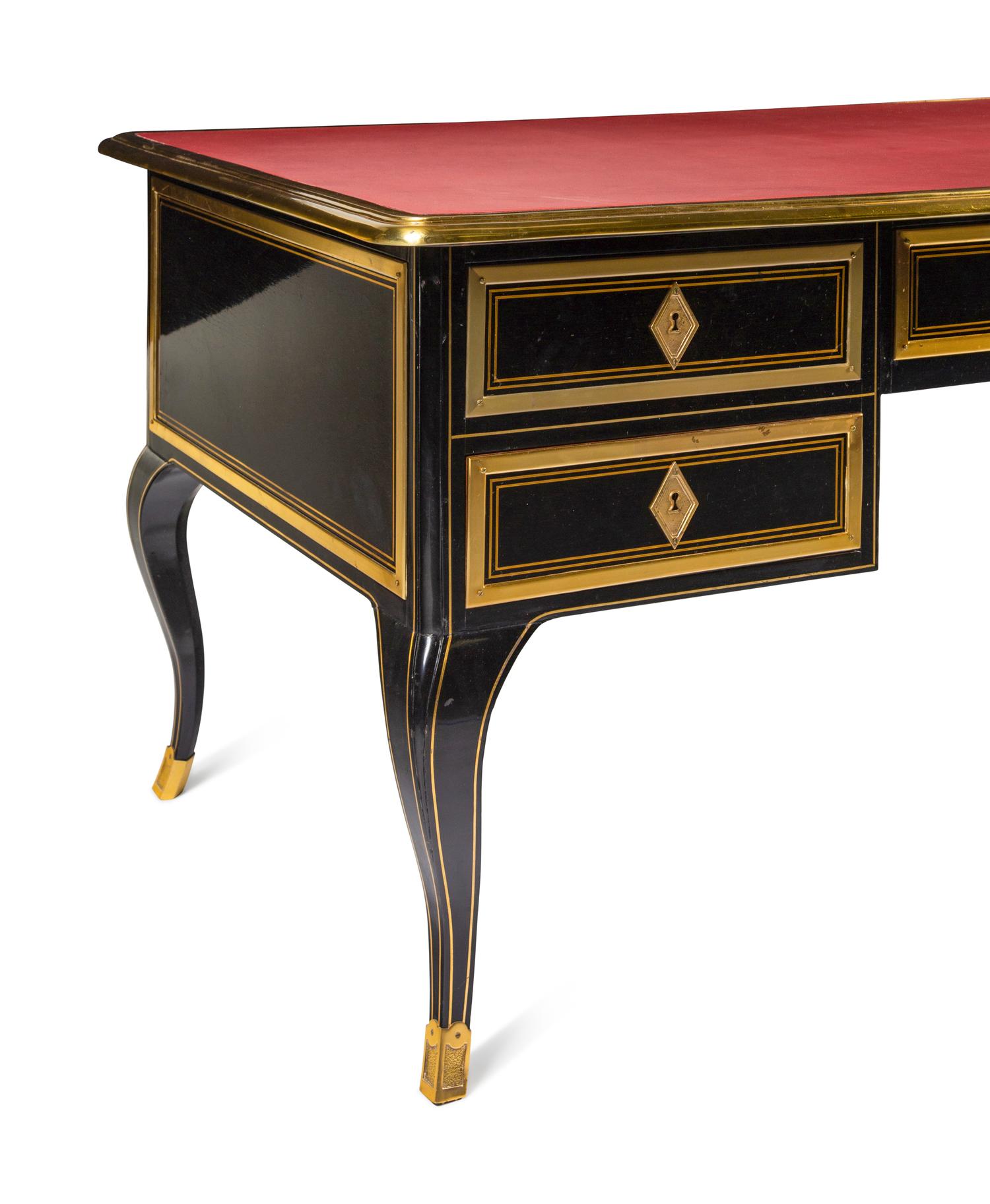 A Régence Style Gilt Bronze-Mounted Ebonized Bureau Plat