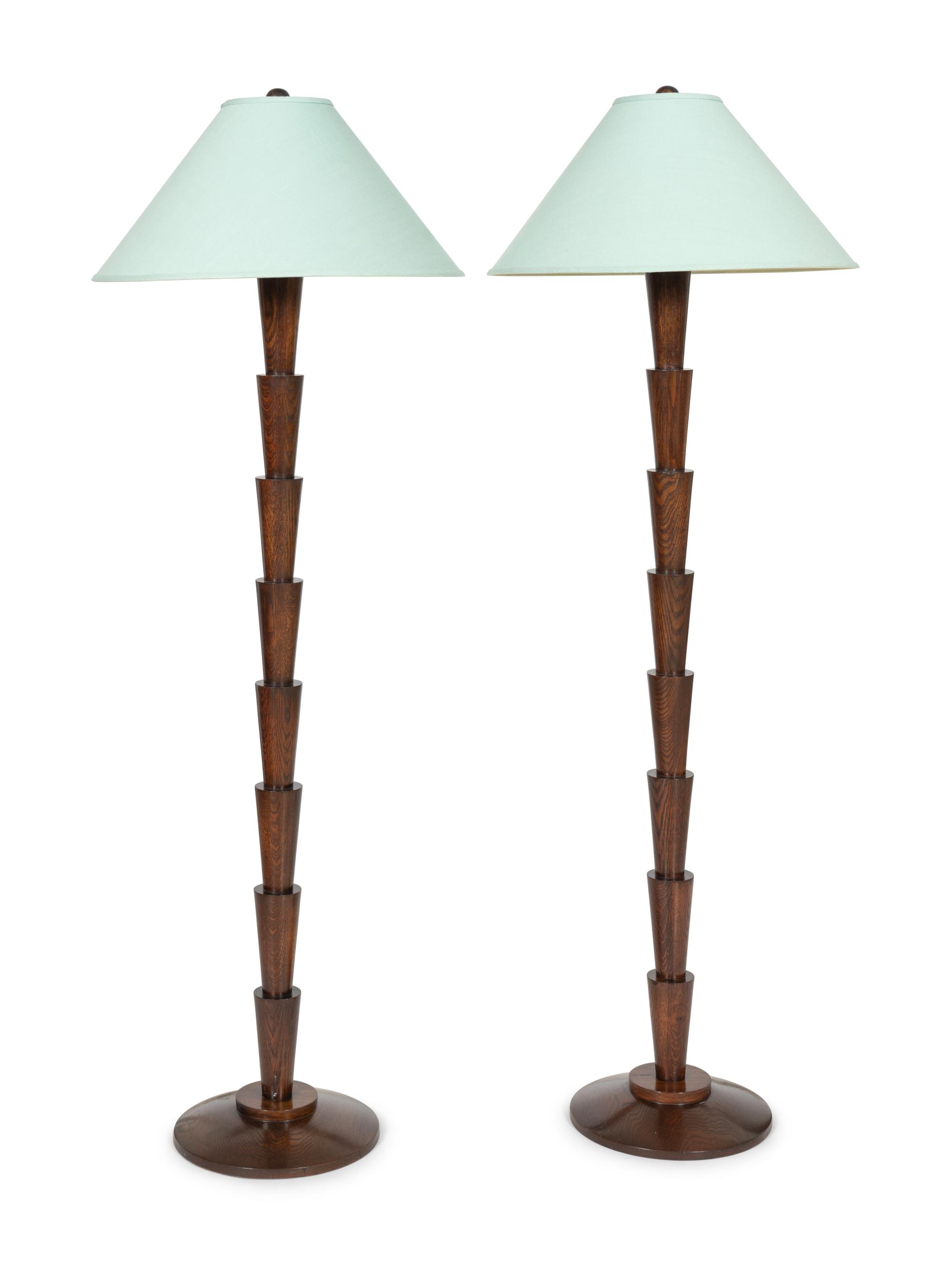 A Pair of Art Deco Style Oak Floor Lamps
