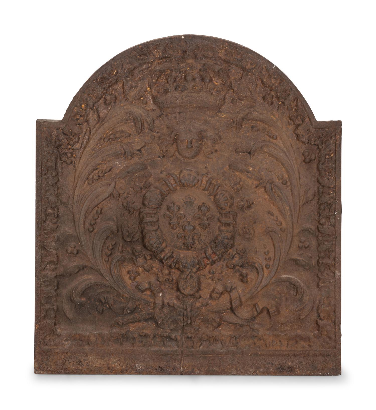 A Cast Iron Fireplace Back