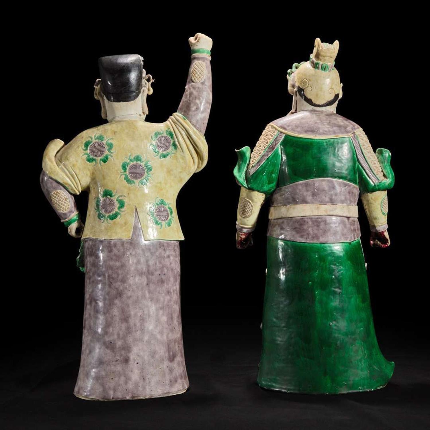 An unusual pair of large Chinese famille-verte decorated porcelain guardians 五彩门神一对 18th century ????