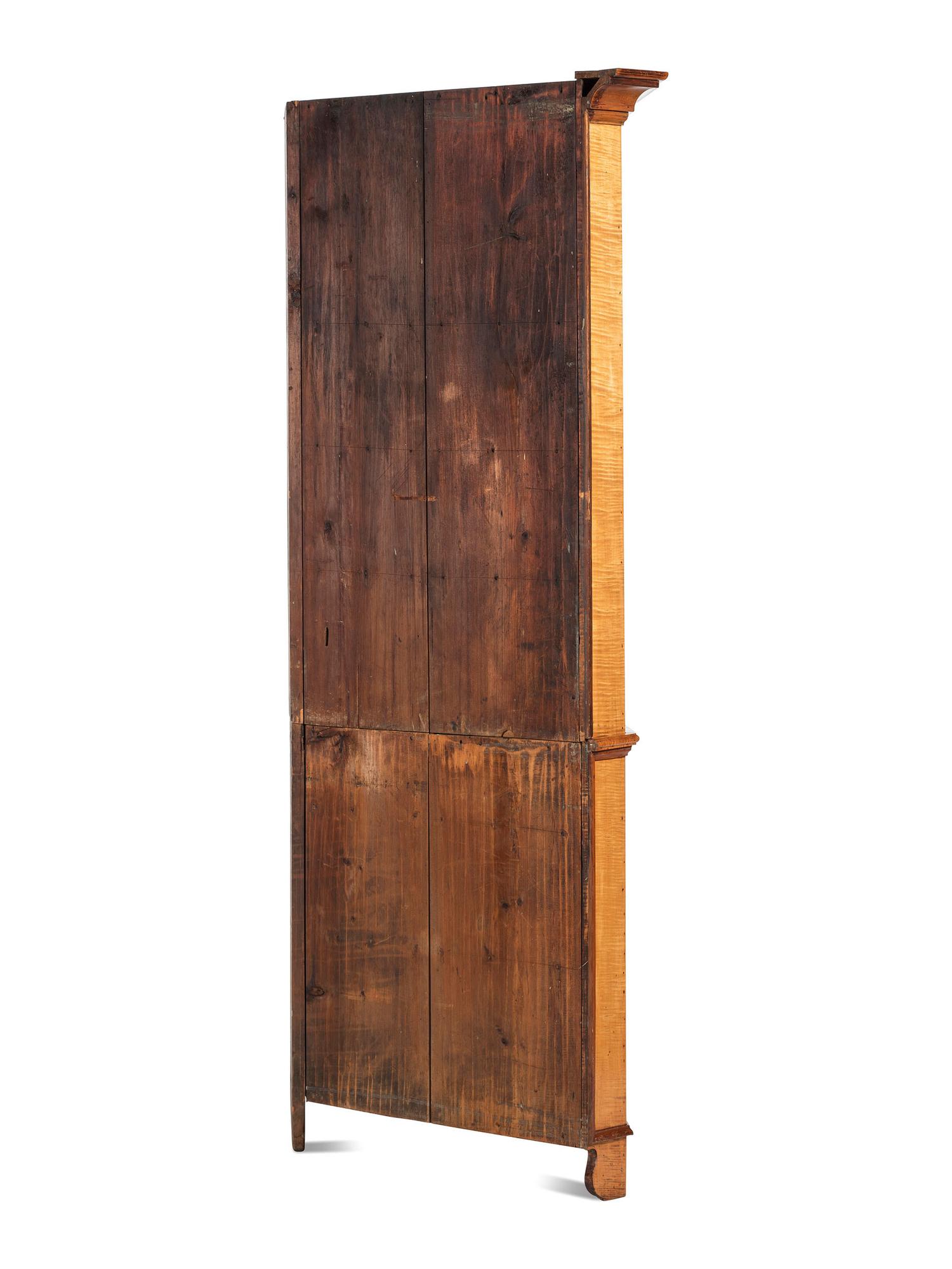A Federal Style Tiger Maple Corner Cupboard