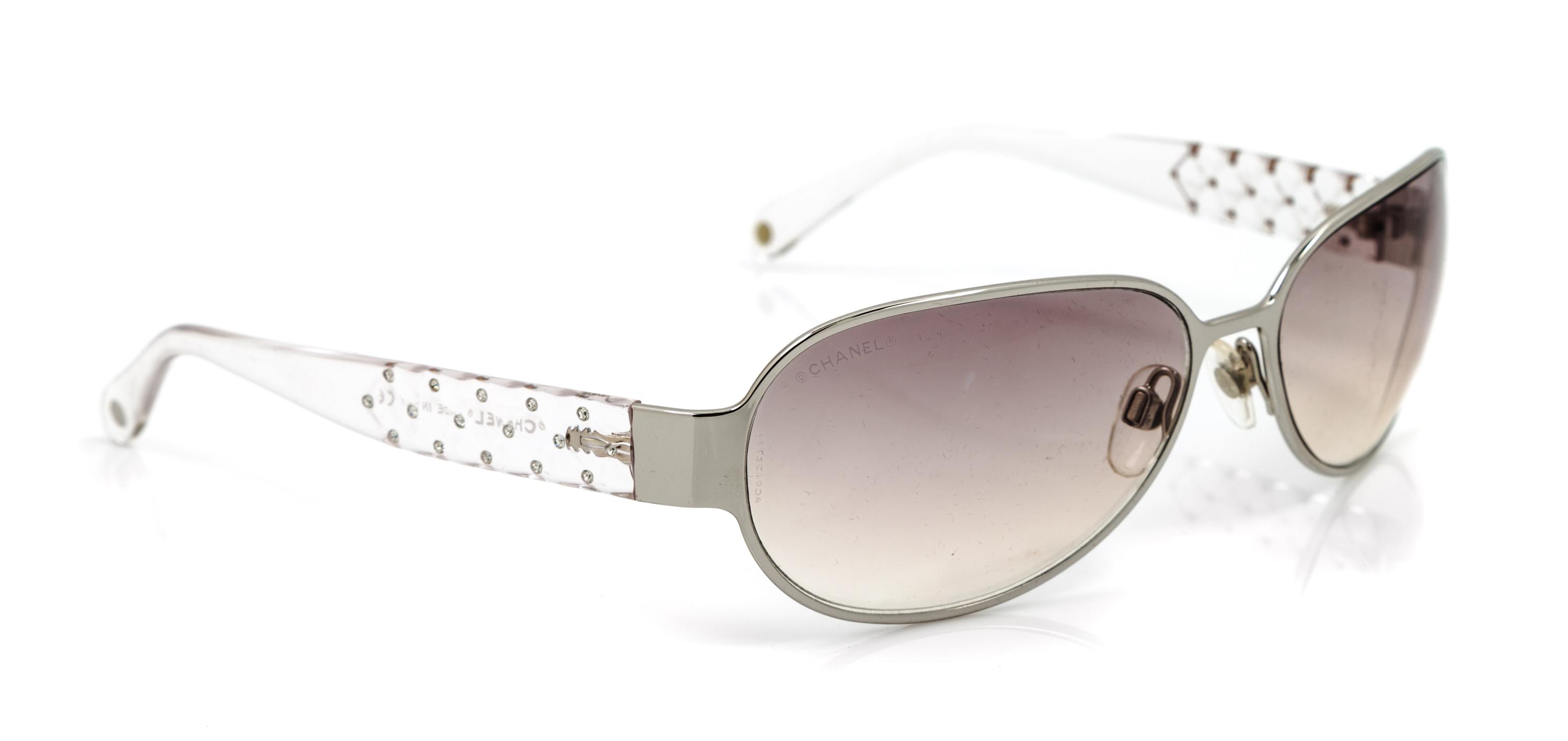 A Pair of Chanel Silver Frame Sunglasses,