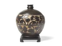 A Chinese Cizhou Style Carved Stoneware Jar