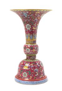 A Ruby-Ground Famille Rose Porcelain Gu -Form Vase Height 11 inches.