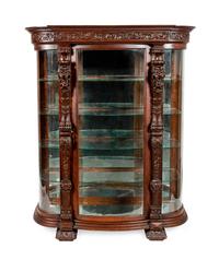 A Renaissance Revival Carved Oak Vitrine