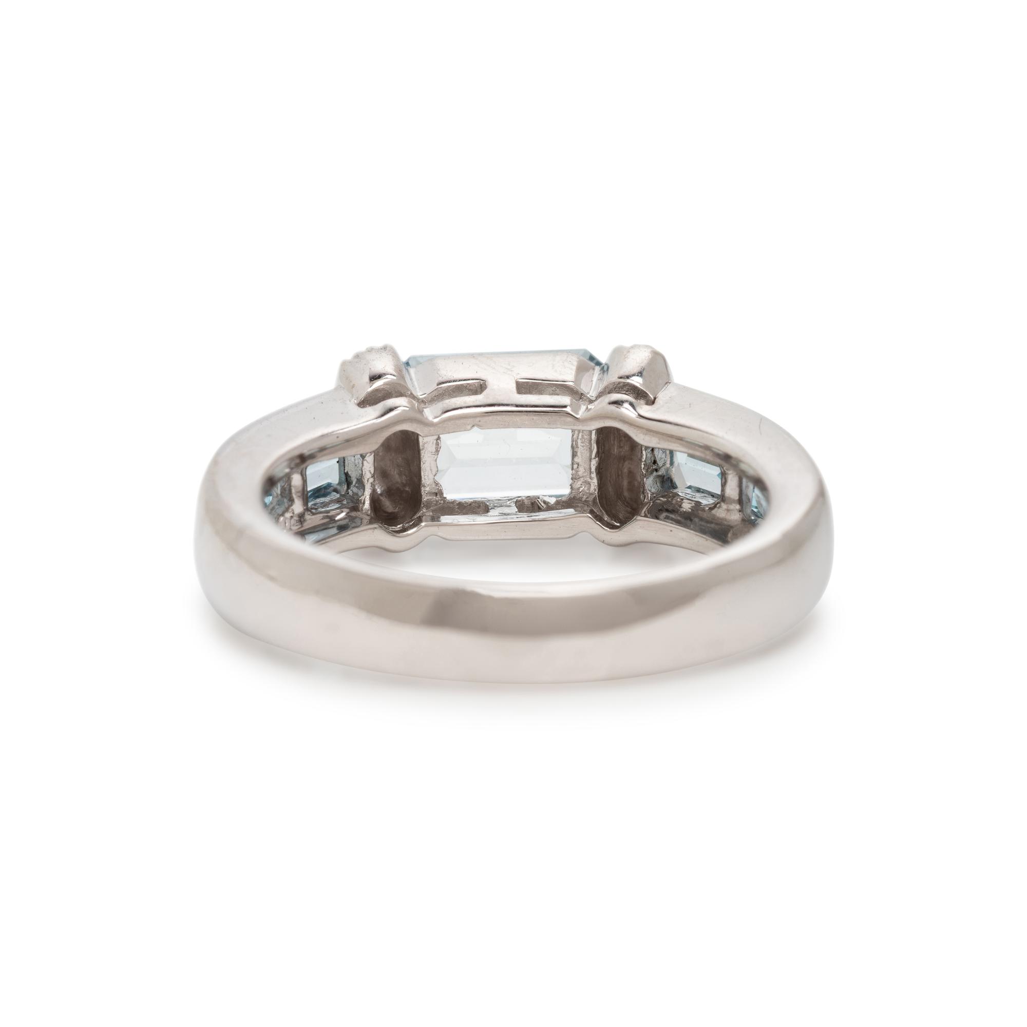 Two White Gold, Diamond, Garnet, and Aquamarine Stacking Rings