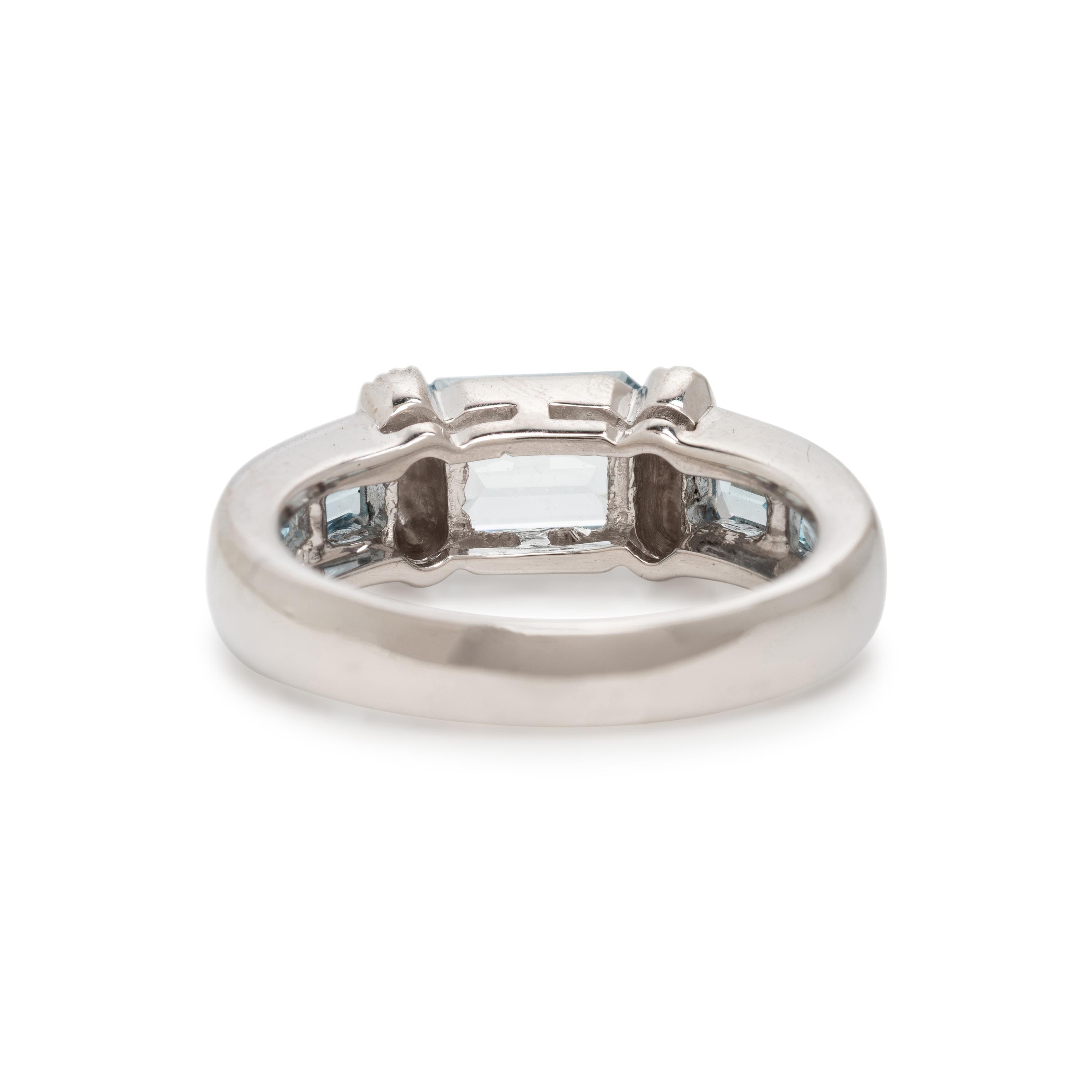 Two White Gold, Diamond, Garnet, and Aquamarine Stacking Rings