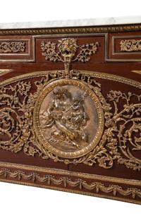 A Louis XVI Style Gilt Bronze Mounted Mahogany Marble-Top Commode à Vantaux After the Model by Guillaume Benneman