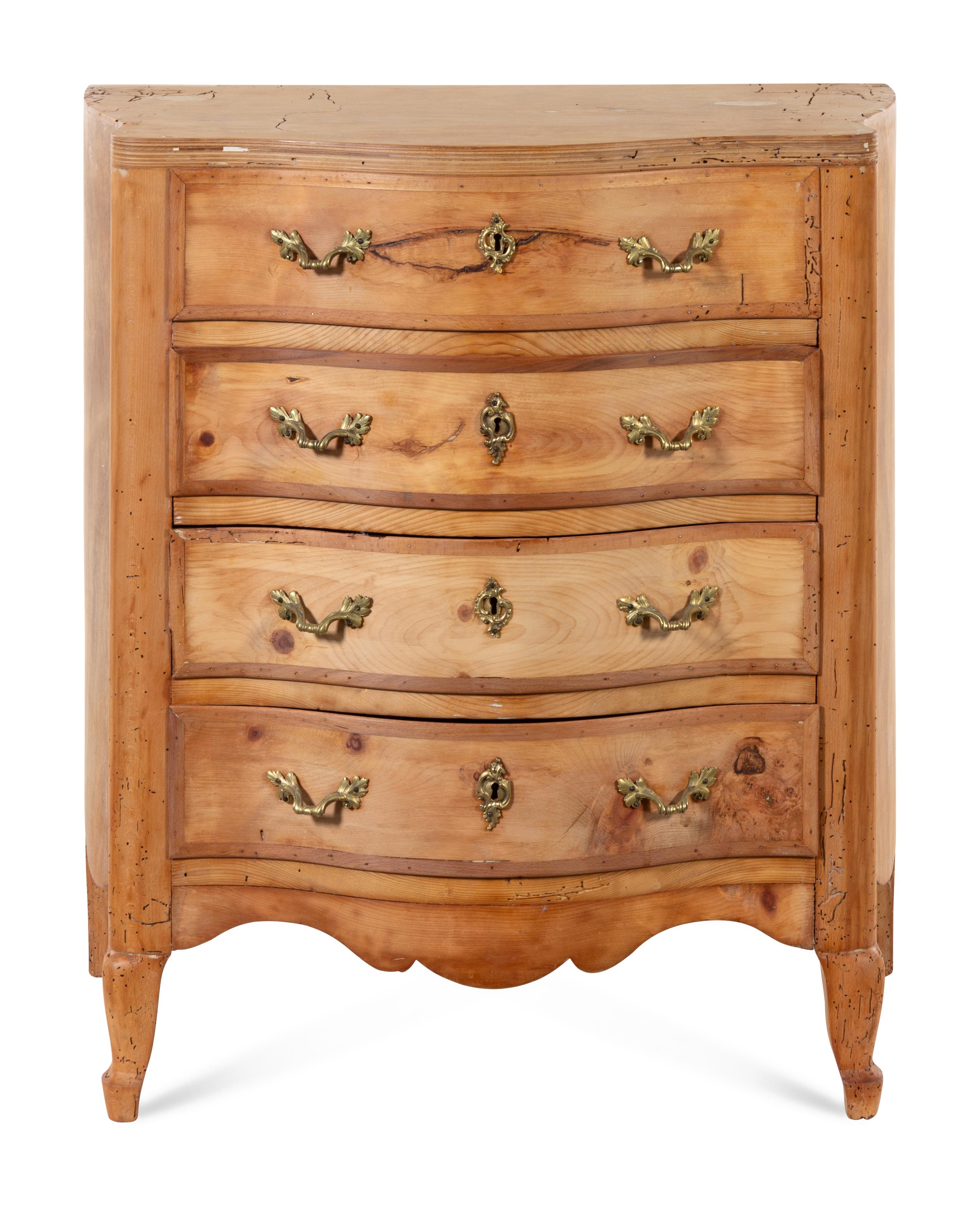 A Continental Fruitwood Chest of Drawers