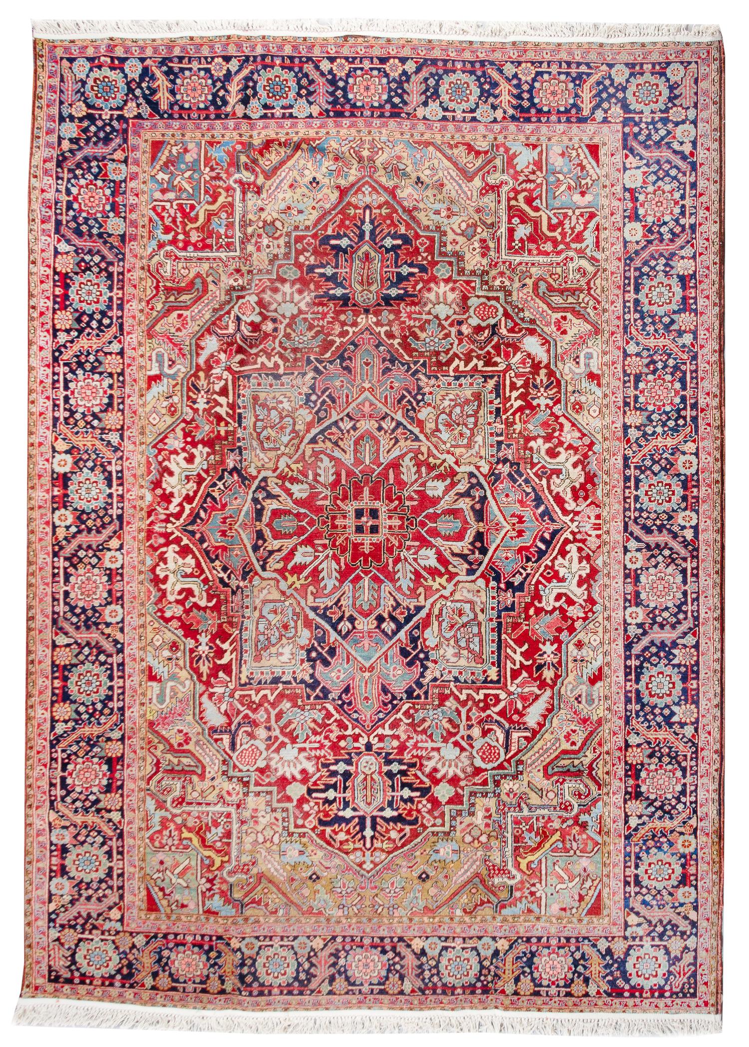 A Heriz Wool Rug 10 feet 11 inches x 8 feet 3 inches. — 20TH CENTURY
