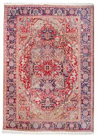 A Heriz Wool Rug 10 feet 11 inches x 8 feet 3 inches. — 20TH CENTURY