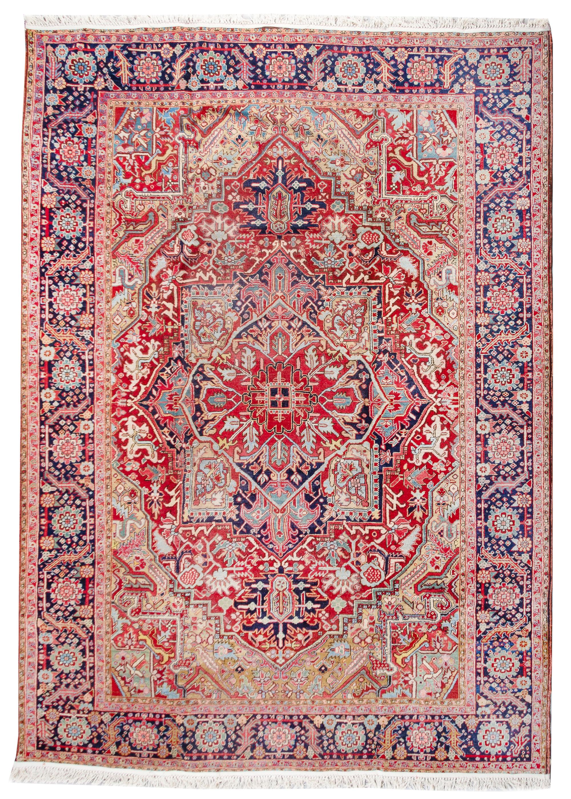 A Heriz Wool Rug 10 feet 11 inches x 8 feet 3 inches. — 20TH CENTURY