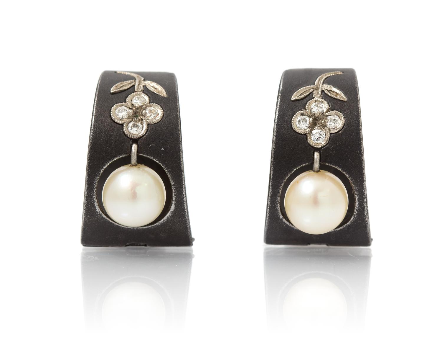A Pair of Art Moderne Blackened Steel, White Gold, Cultured Pearl and Diamond Earclips, Marsh & Co., 6.00 dwts.